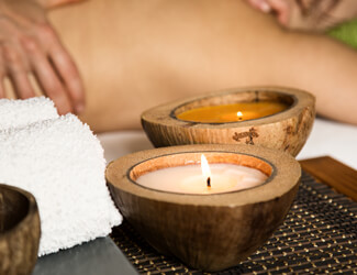 Relaxing scented candle massage