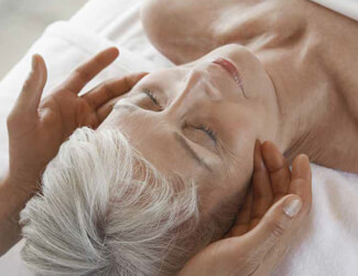 Mother enjoying facial treatment